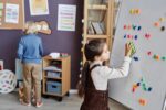 Chore chart on wall with shared family responsibilities